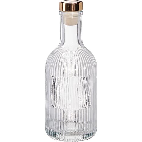 Flaske Med Guldfarvet Låg
