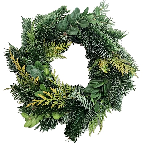 Adventskrans med forskellige naturmaterialer