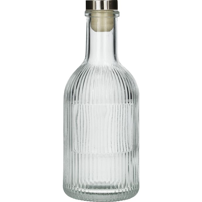 Flaske med guldfarvet låg