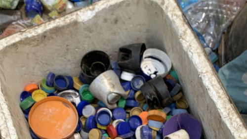 ocean plastic forum samlet plastiklaag i kasse