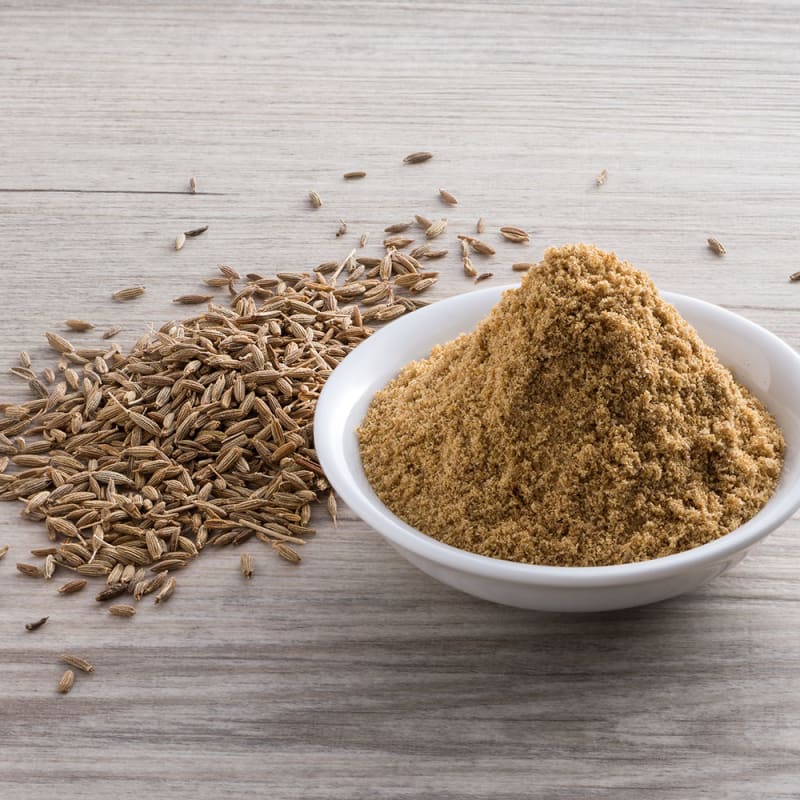 spidskommen knust og på bord